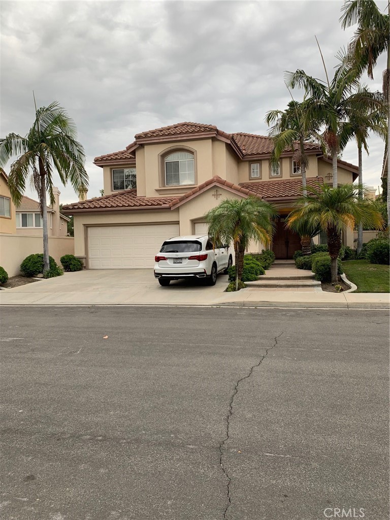 a car parked in front of a house