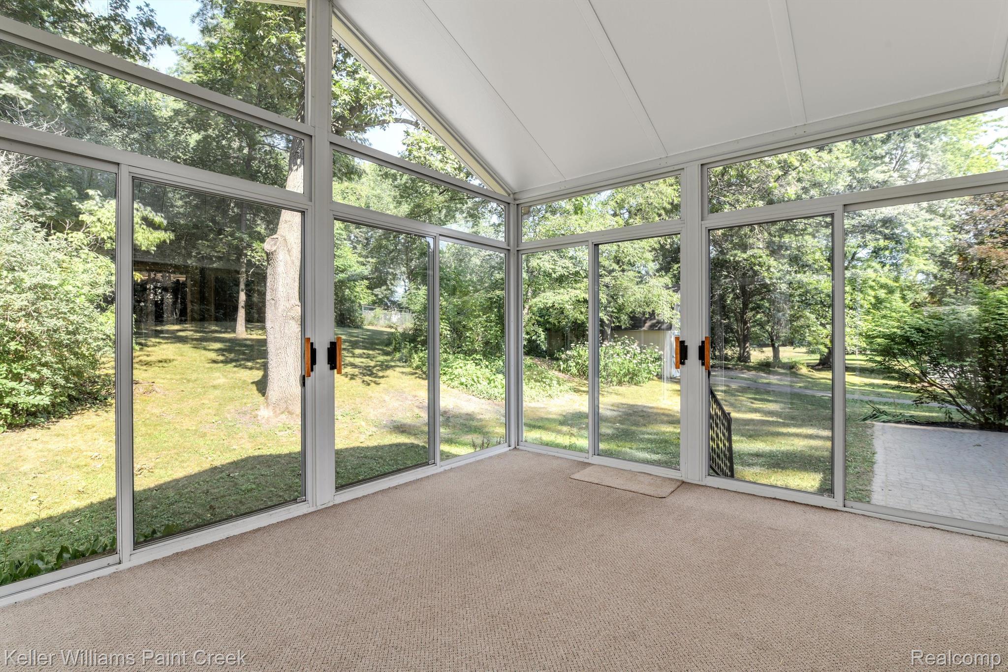 3560 Rohr Road Lake Orion, MI 48359 - Photo 6 of 22 Watch the seasons change in this awesome sunroom!
