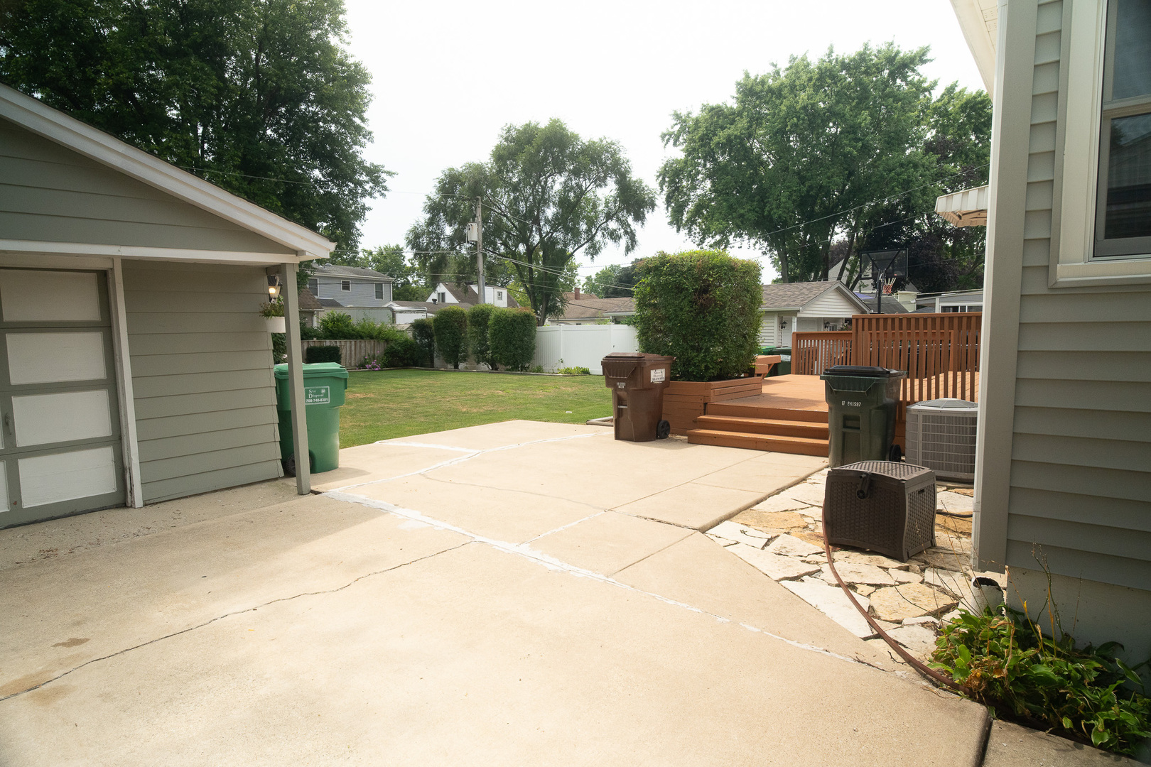 6645 Riverside Drive Tinley Park, IL 60477 - Photo 28 of 38 a view of a patio with table and chairs and potted plants