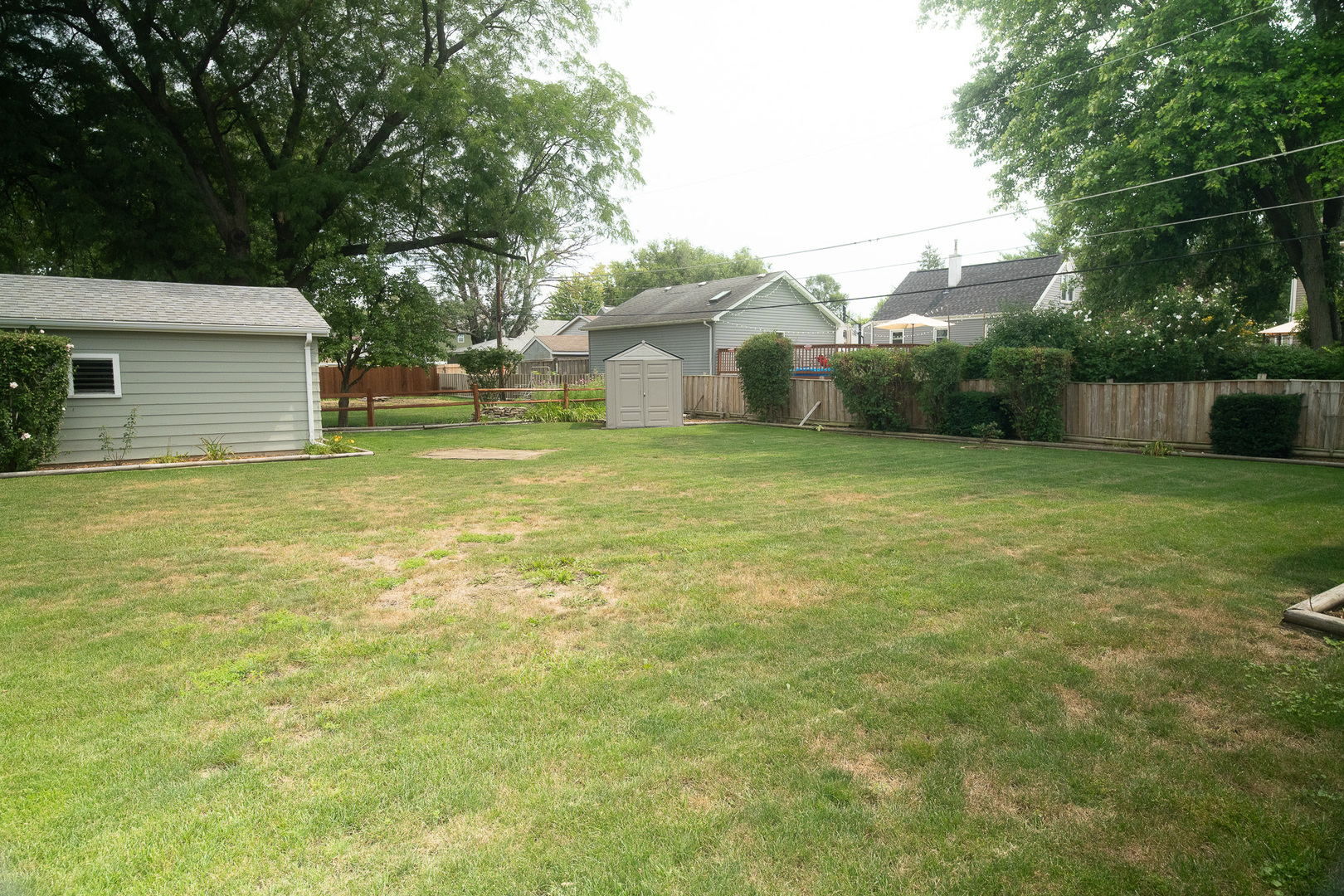 6645 Riverside Drive Tinley Park, IL 60477 - Photo 30 of 38 a view of a big yard with a house and large trees