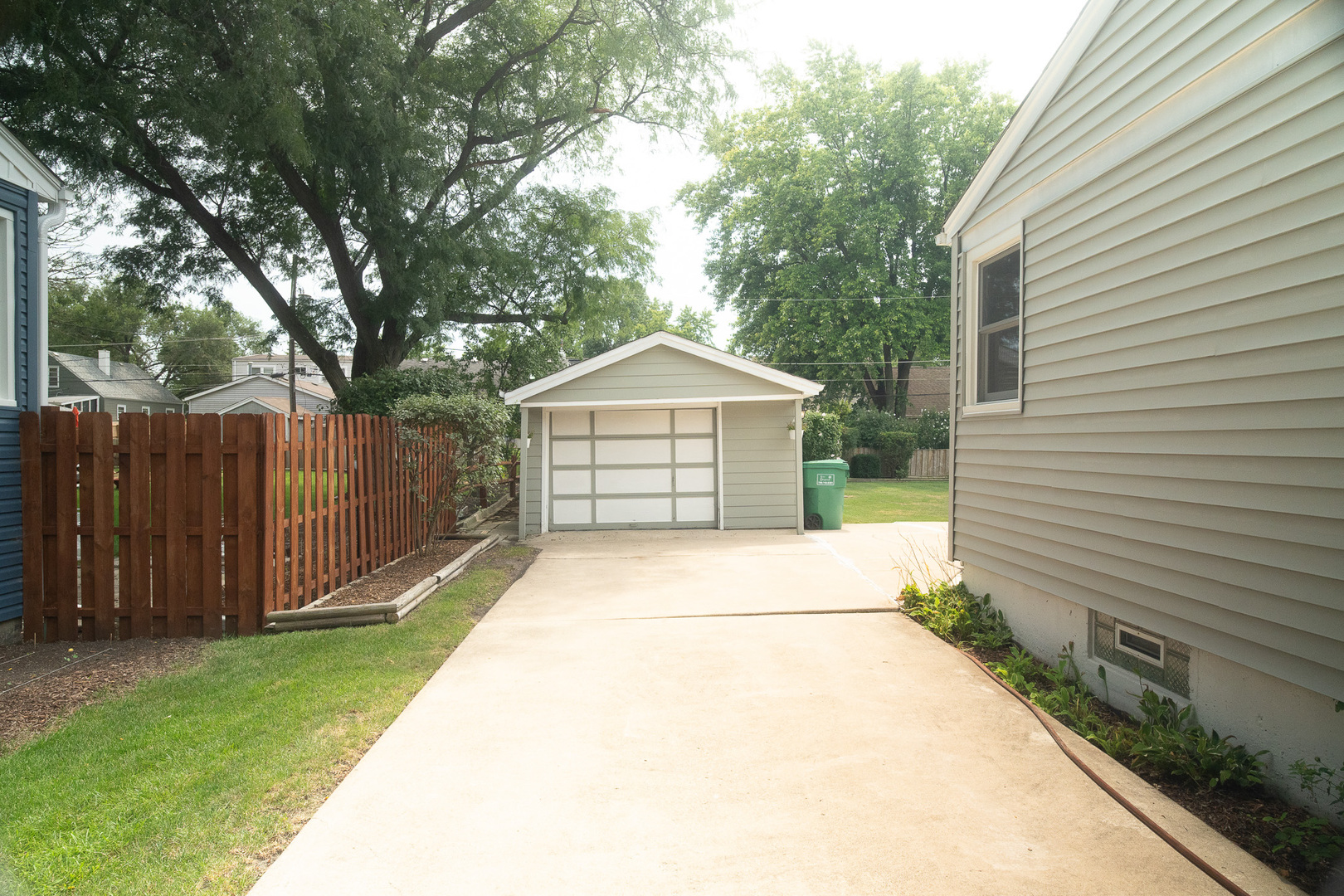 6645 Riverside Drive Tinley Park, IL 60477 - Photo 32 of 38 a view of house with backyard and trees