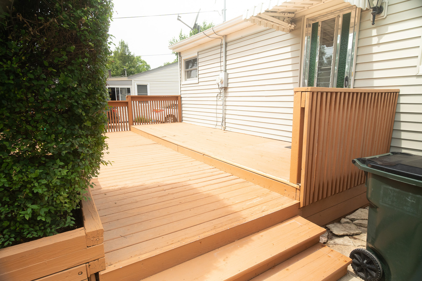 6645 Riverside Drive Tinley Park, IL 60477 - Photo 34 of 38 a view of a balcony with chair and floor to ceiling window