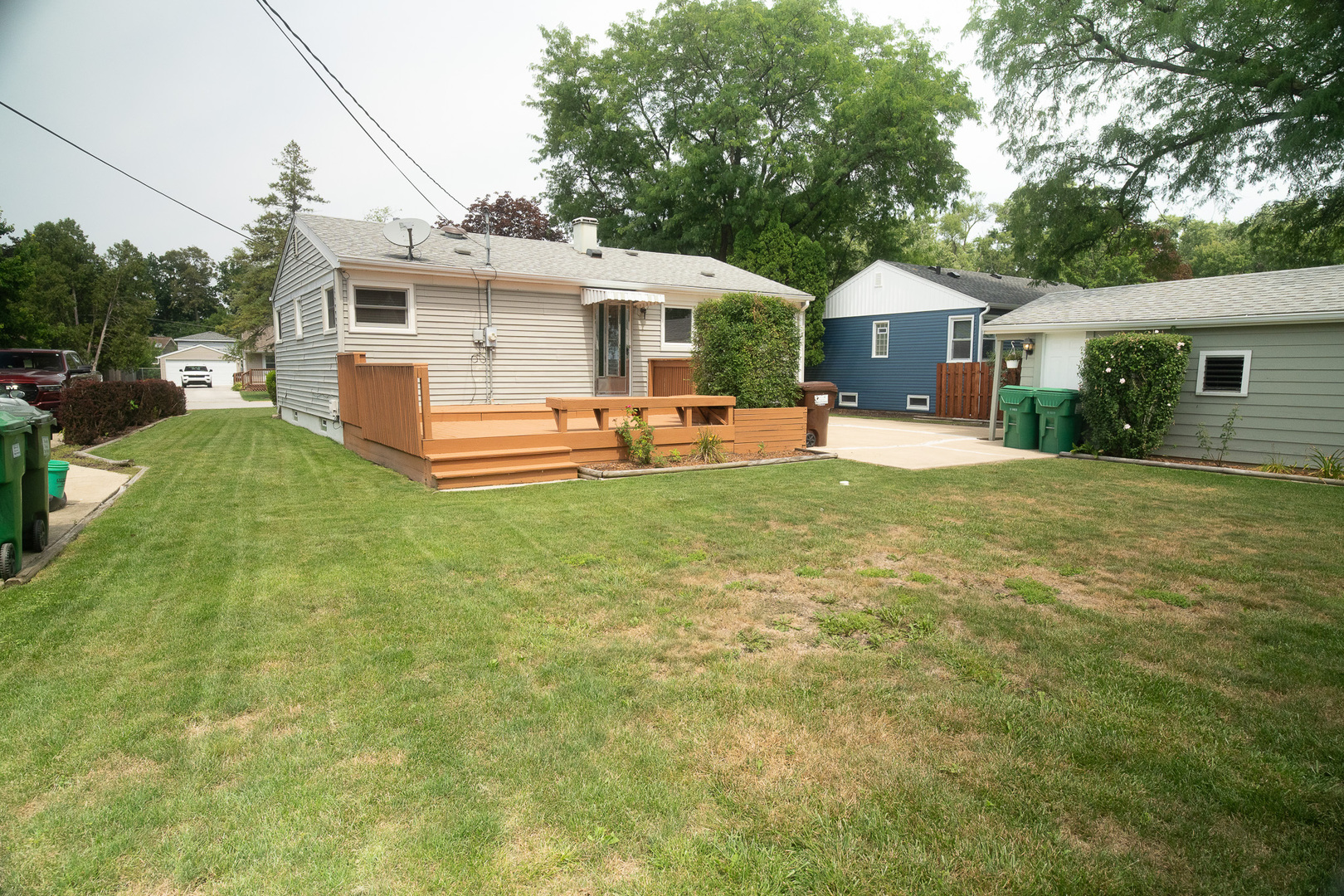 6645 Riverside Drive Tinley Park, IL 60477 - Photo 4 of 38 a front view of a house with a yard porch and furniture