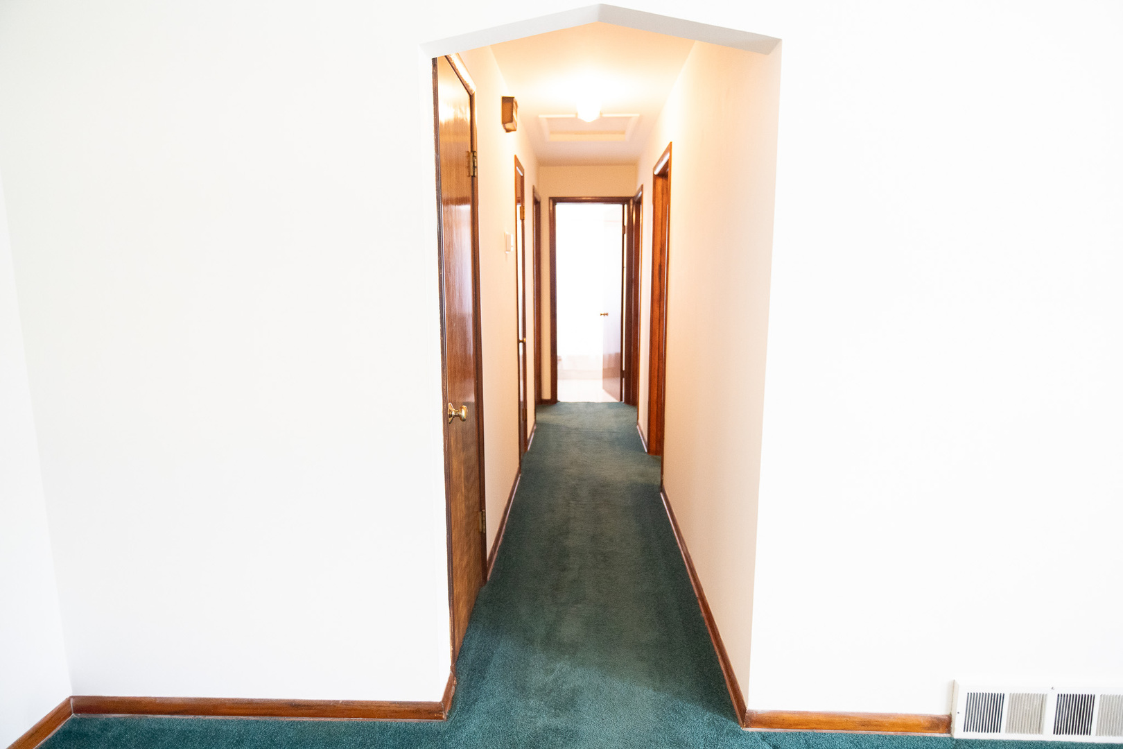 6645 Riverside Drive Tinley Park, IL 60477 - Photo 8 of 38 a view of a hallway with white walls