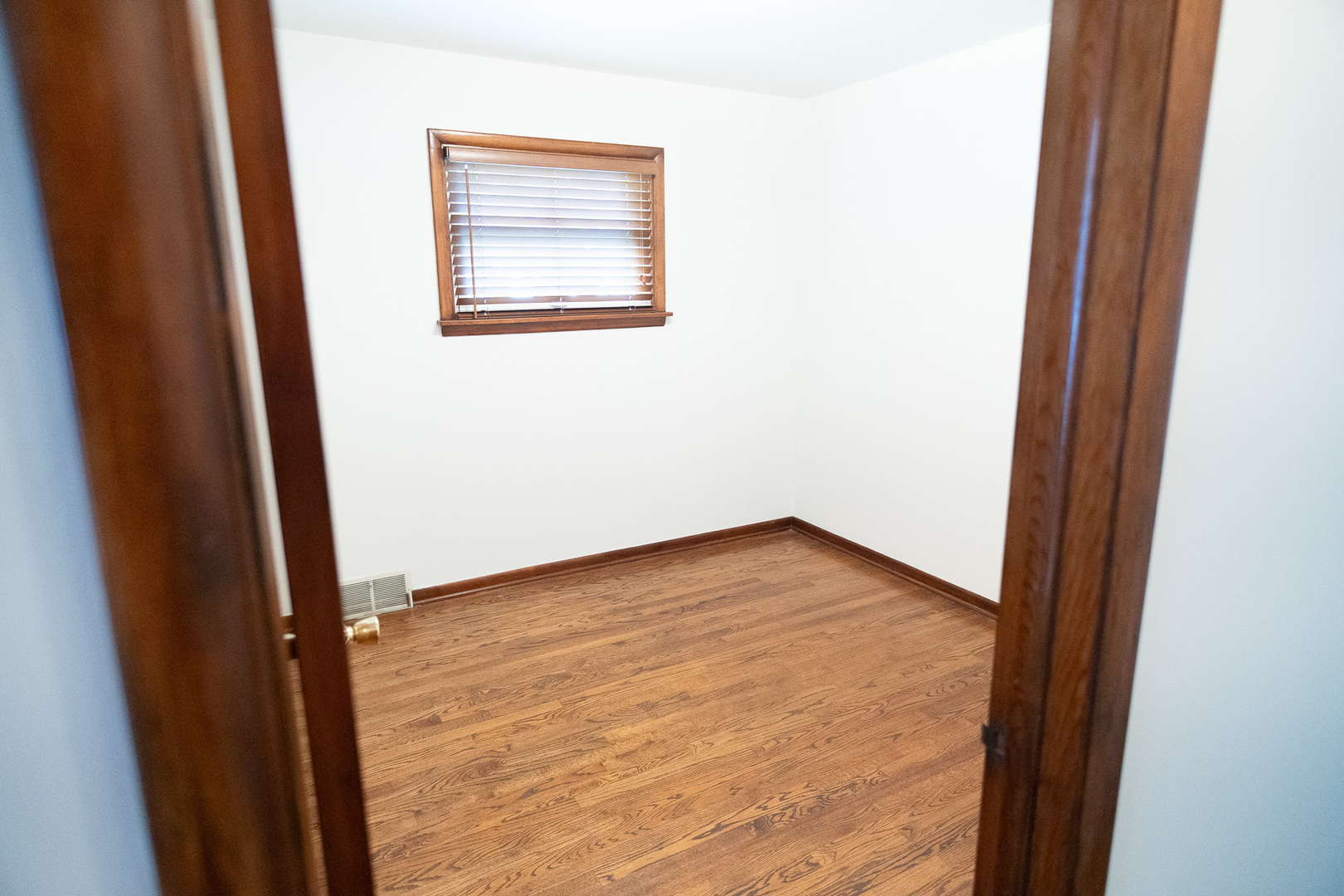 6645 Riverside Drive Tinley Park, IL 60477 - Photo 9 of 38 a view of an empty room and wooden floor