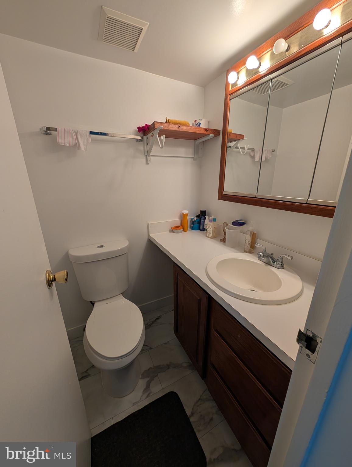3230 Spartan Road Olney, MD 20832 - Photo 15 of 27 main bedroom half bath