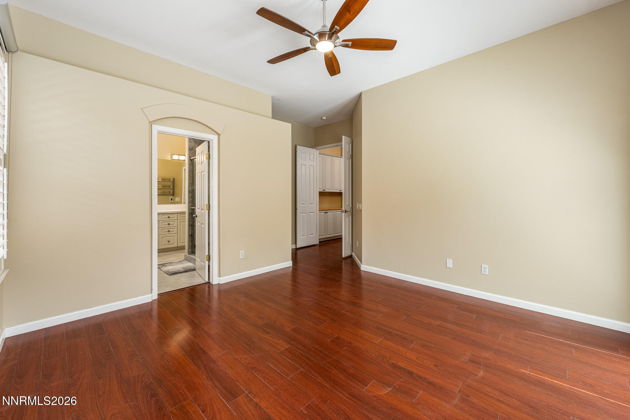 1840 Hunter Creek Road Reno, NV 89519 - Photo 14 of 39 a view of an empty room with wooden floor