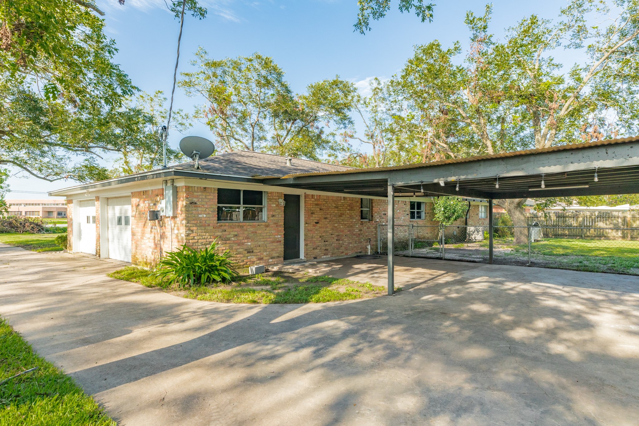 908 West Mulberry Street Angleton, TX 77515 - Photo 21 of 22 a view of back yard of the house