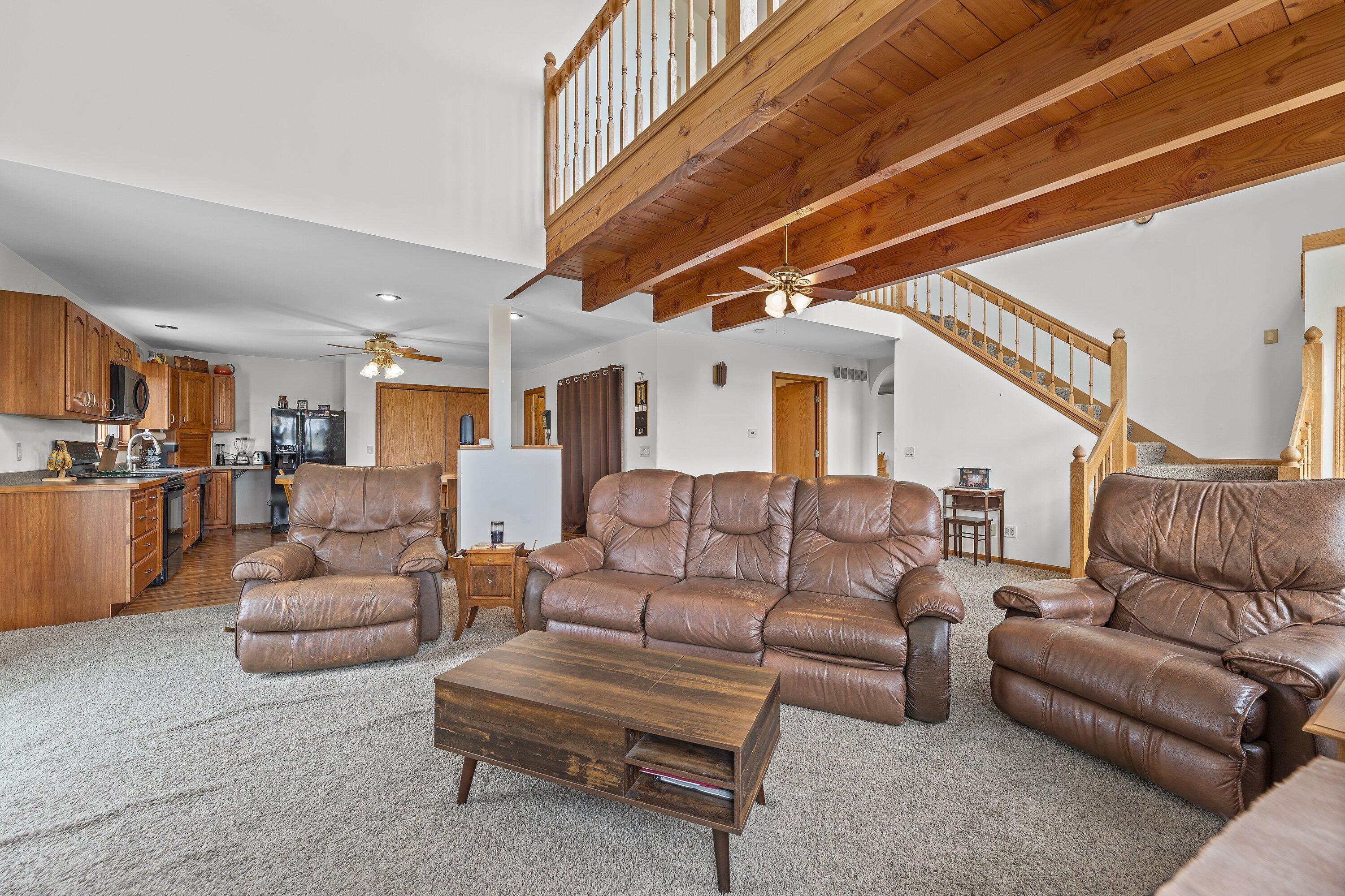 7293 Aurora Road Addison, WI 53090 - Photo 22 of 95 living room to kitchen