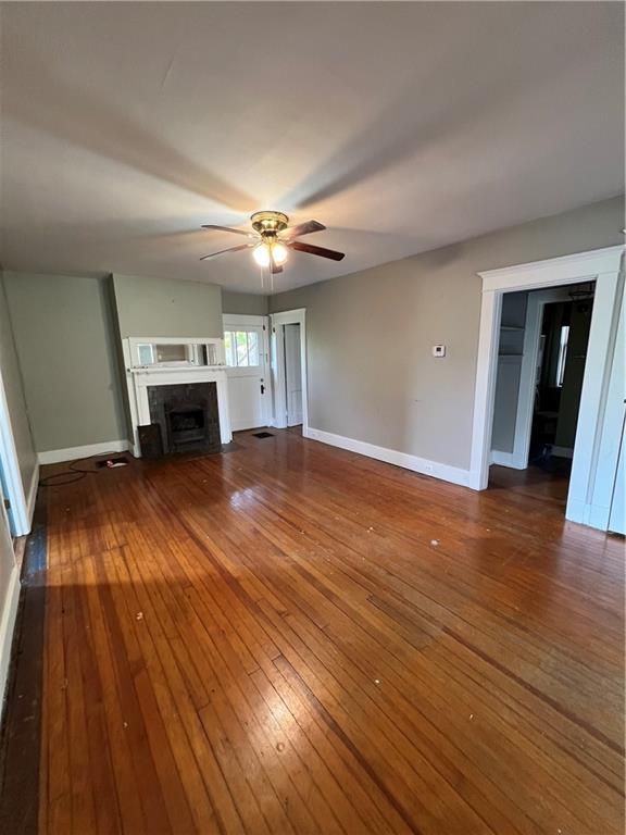 1109 Mccomb Lane Pittsburgh, PA 15239 - Photo 11 of 41 wooden floor in an empty room with a window