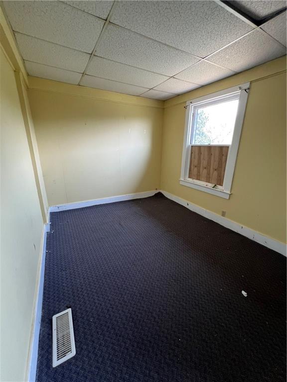 1109 Mccomb Lane Pittsburgh, PA 15239 - Photo 12 of 41 an empty room with windows