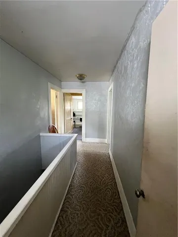 a view of livingroom with hardwood floor and a ceiling fan