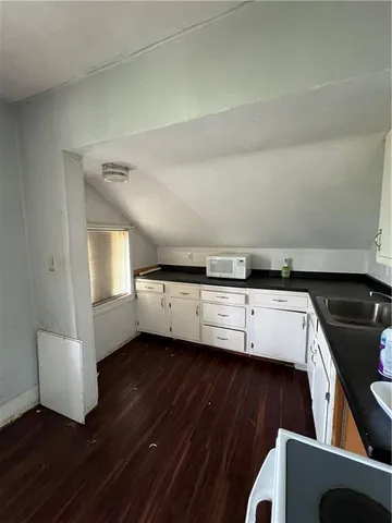 a view of a livingroom with a staircase
