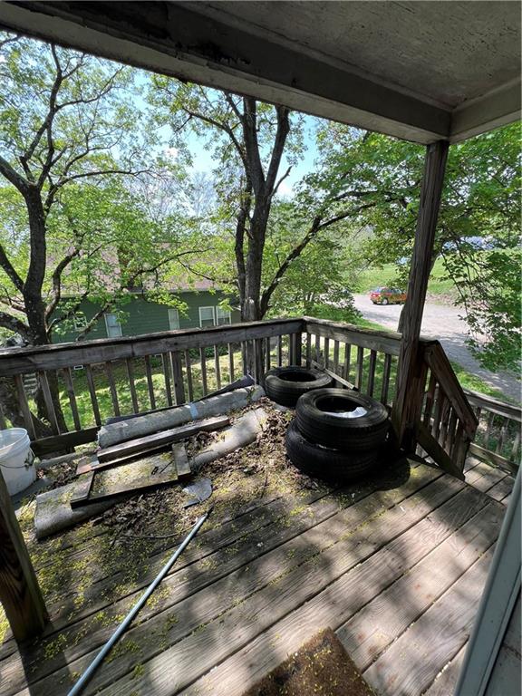 1109 Mccomb Lane Pittsburgh, PA 15239 - Photo 30 of 41 a view of a wooden deck with a bench