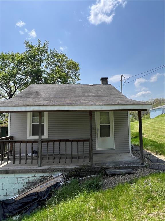 1109 Mccomb Lane Pittsburgh, PA 15239 - Photo 34 of 41 a front view of a house with garden