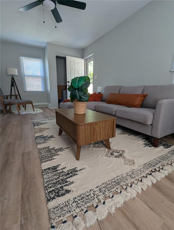 1109 Mccomb Lane Pittsburgh, PA 15239 - Photo 38 of 41 a living room with furniture and a wooden floor