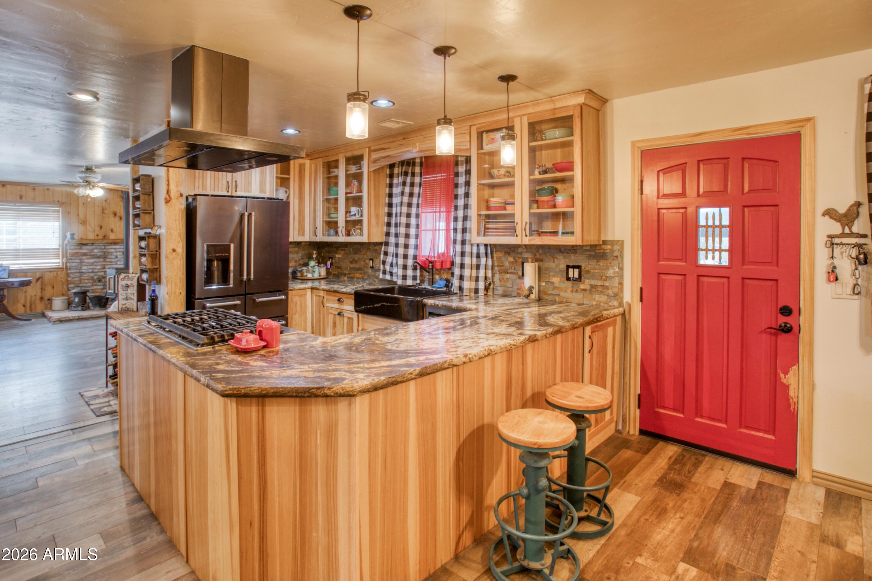 5 Co Road Show Low, AZ 85901 - Photo 9 of 39 a kitchen with stainless steel appliances granite countertop a sink and cabinets