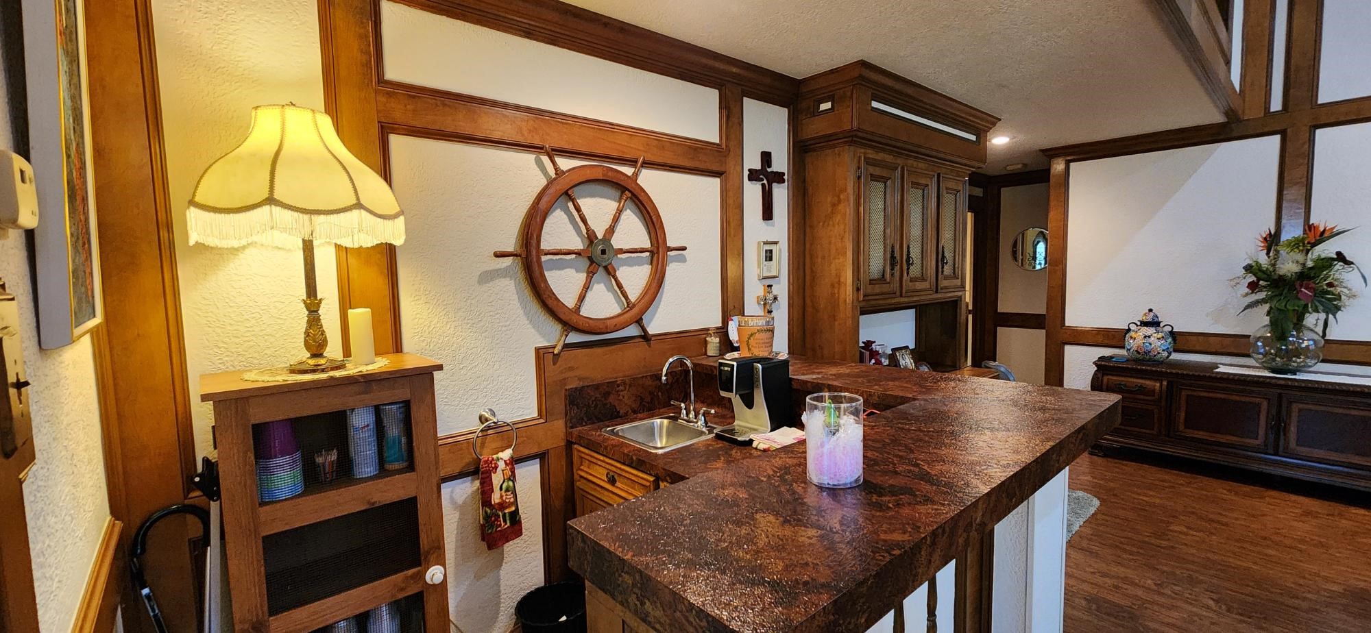 16155 Hexham Drive Spring, TX 77379 - Photo 12 of 47 a dining room with furniture a fireplace and wooden floor