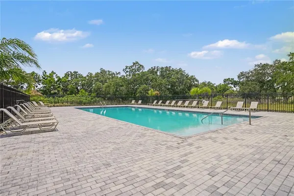 a view of lake with a yard