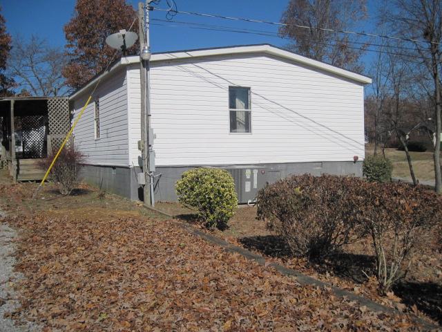 7398 King Road Fairview, TN 37062 - Photo 4 of 19 a backyard of a house with lots of green space