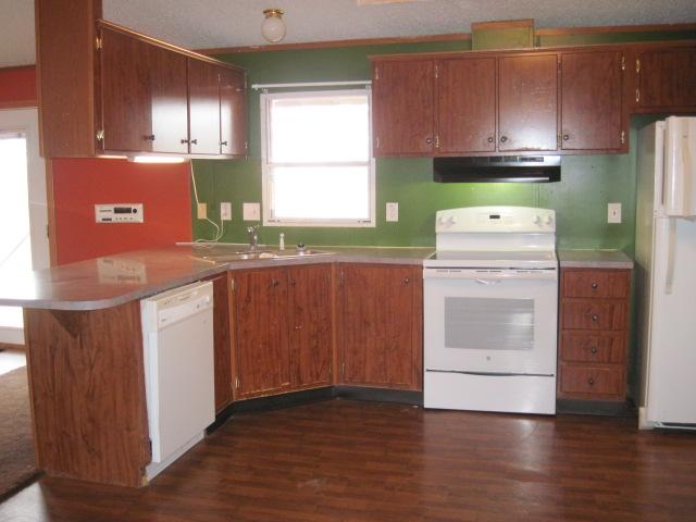 7398 King Road Fairview, TN 37062 - Photo 7 of 19 a kitchen with a stove a sink and a microwave