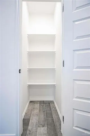 a view of a room with shelves