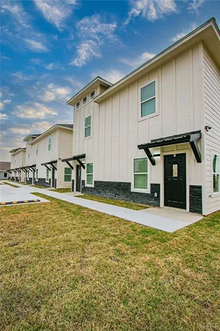 a view of a house with a swimming pool