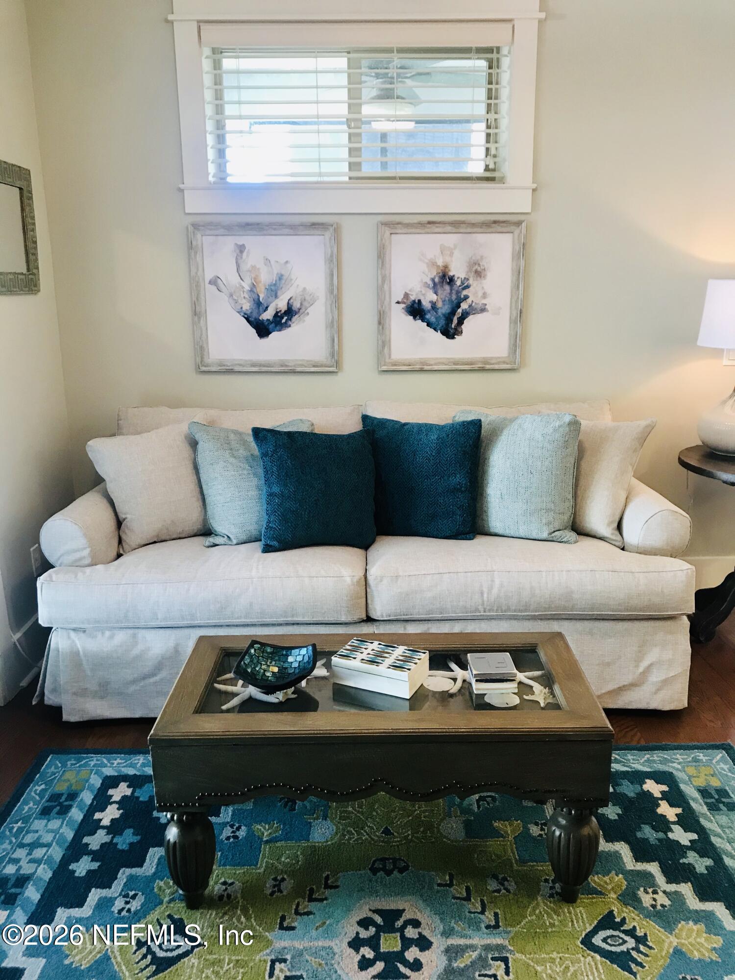 359 Ahern Street Atlantic Beach, FL 32233 - Photo 2 of 15 a living room with furniture and a rug
