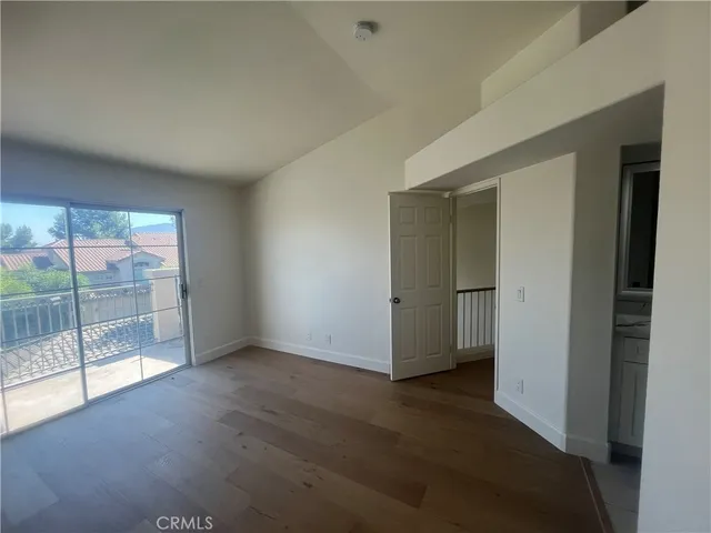 an empty room with sliding door