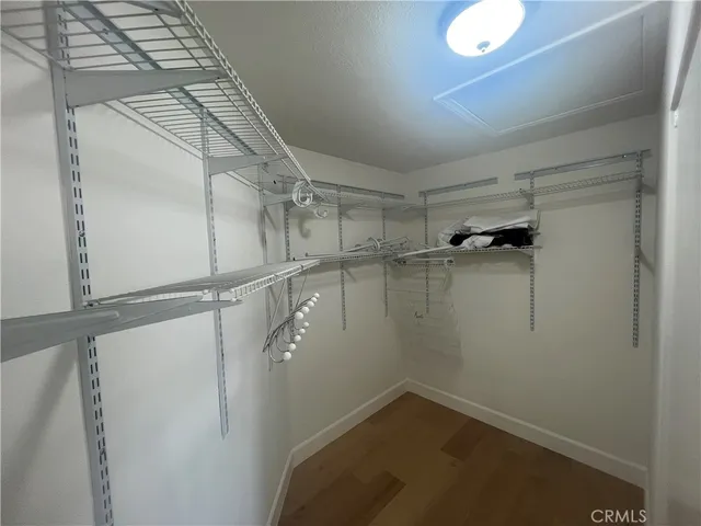 a view of a room with racks on the wall