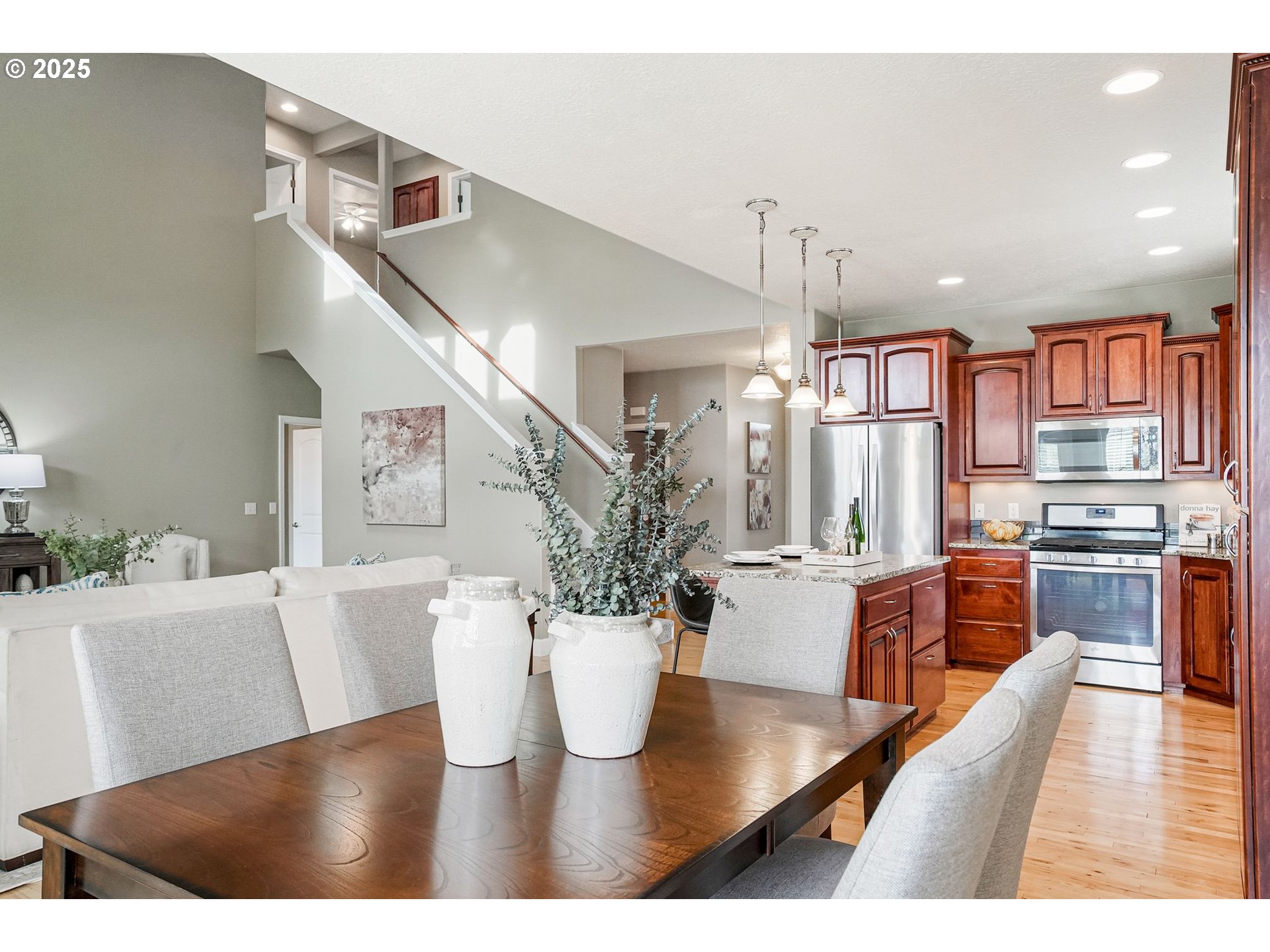 413 Northwest Harold Street Sublimity, OR 97385 - Photo 18 of 48 a view of kitchen and dining area with furniture
