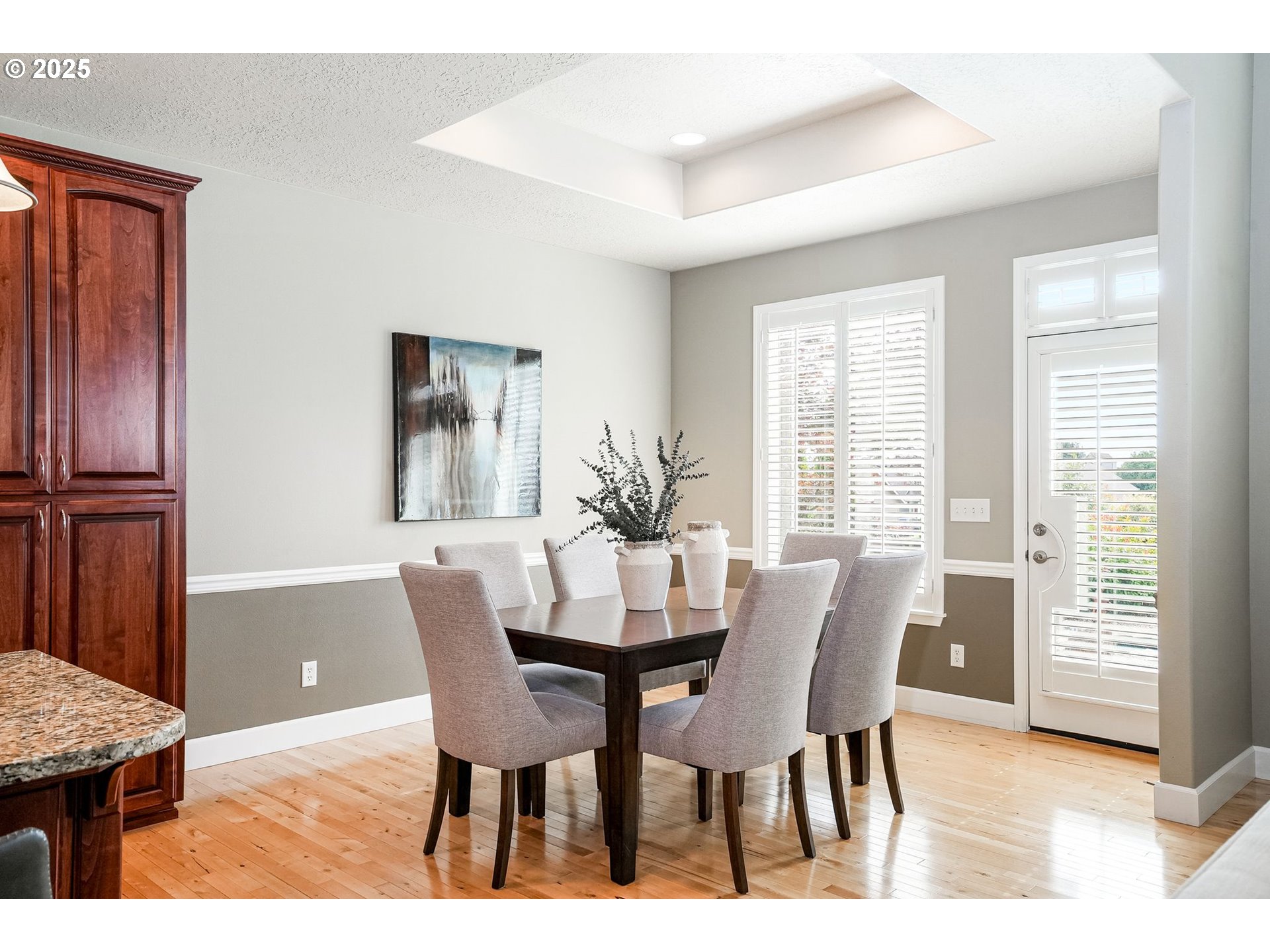 413 Northwest Harold Street Sublimity, OR 97385 - Photo 19 of 48 a view of a dining room with furniture and wooden floor