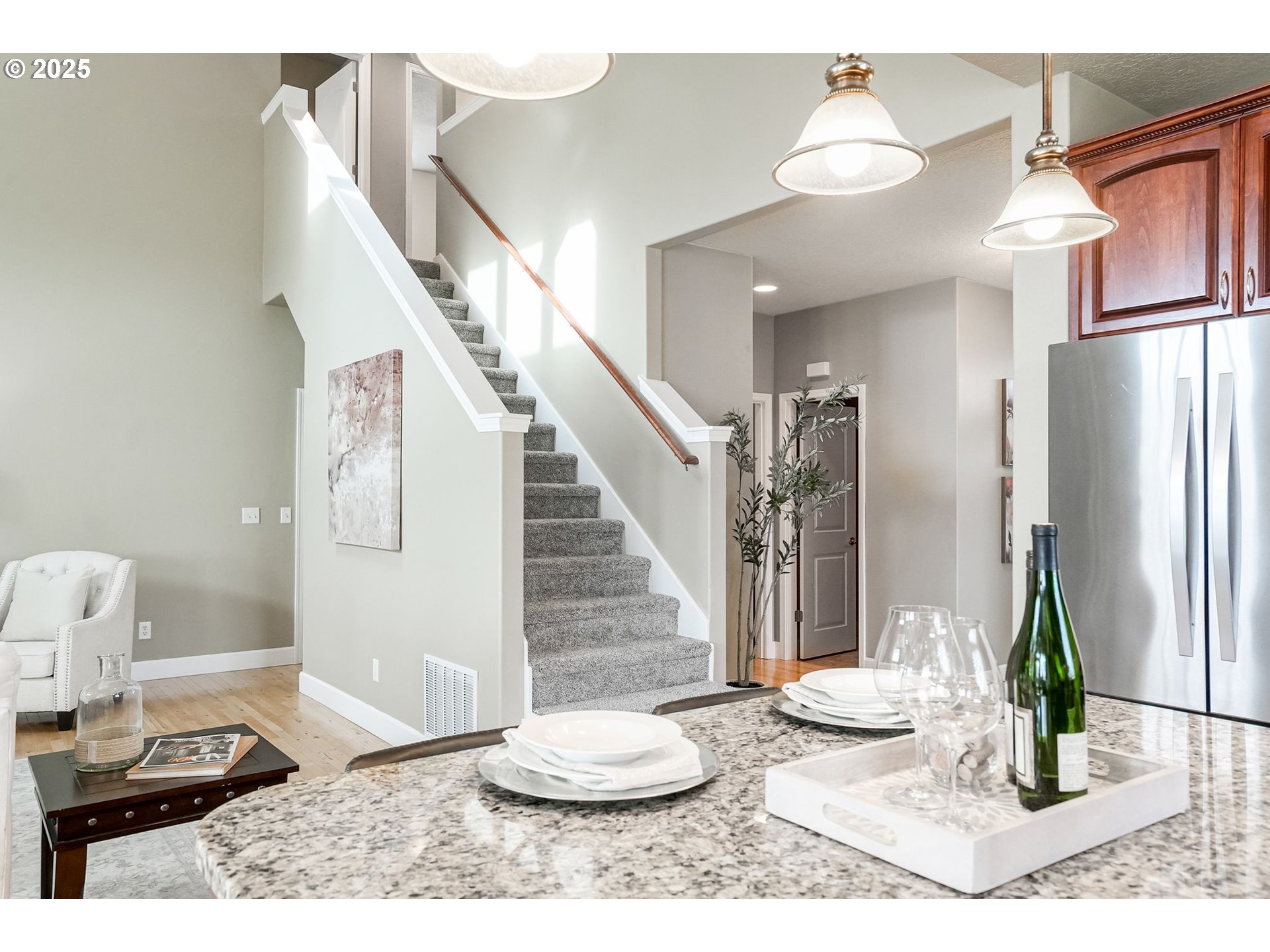 413 Northwest Harold Street Sublimity, OR 97385 - Photo 20 of 48 a view of a living room and a chandelier