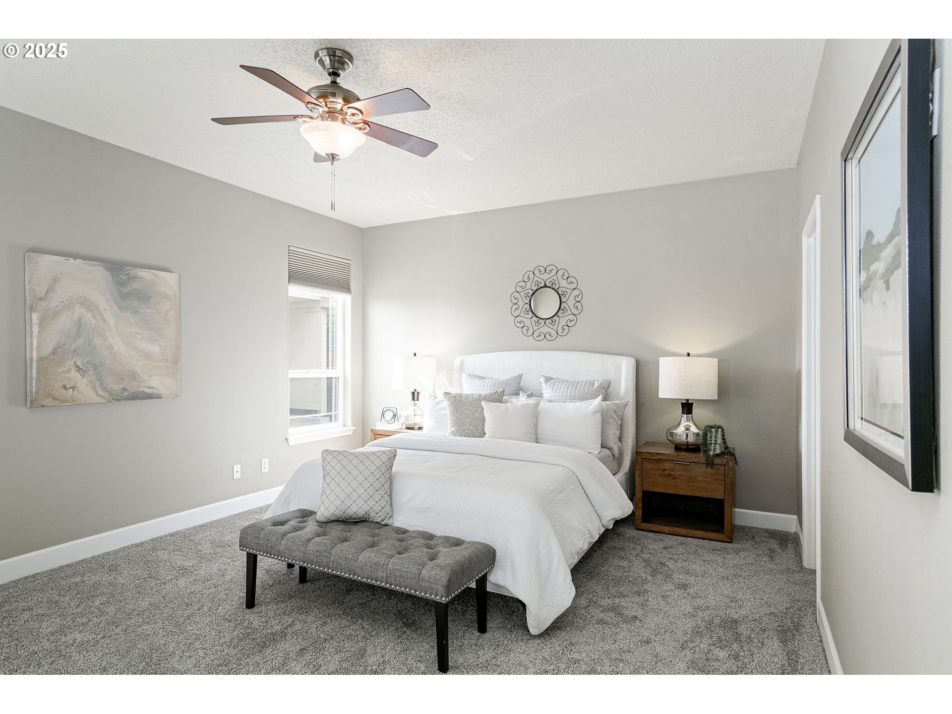 413 Northwest Harold Street Sublimity, OR 97385 - Photo 21 of 48 a bedroom with a bed and a chandelier