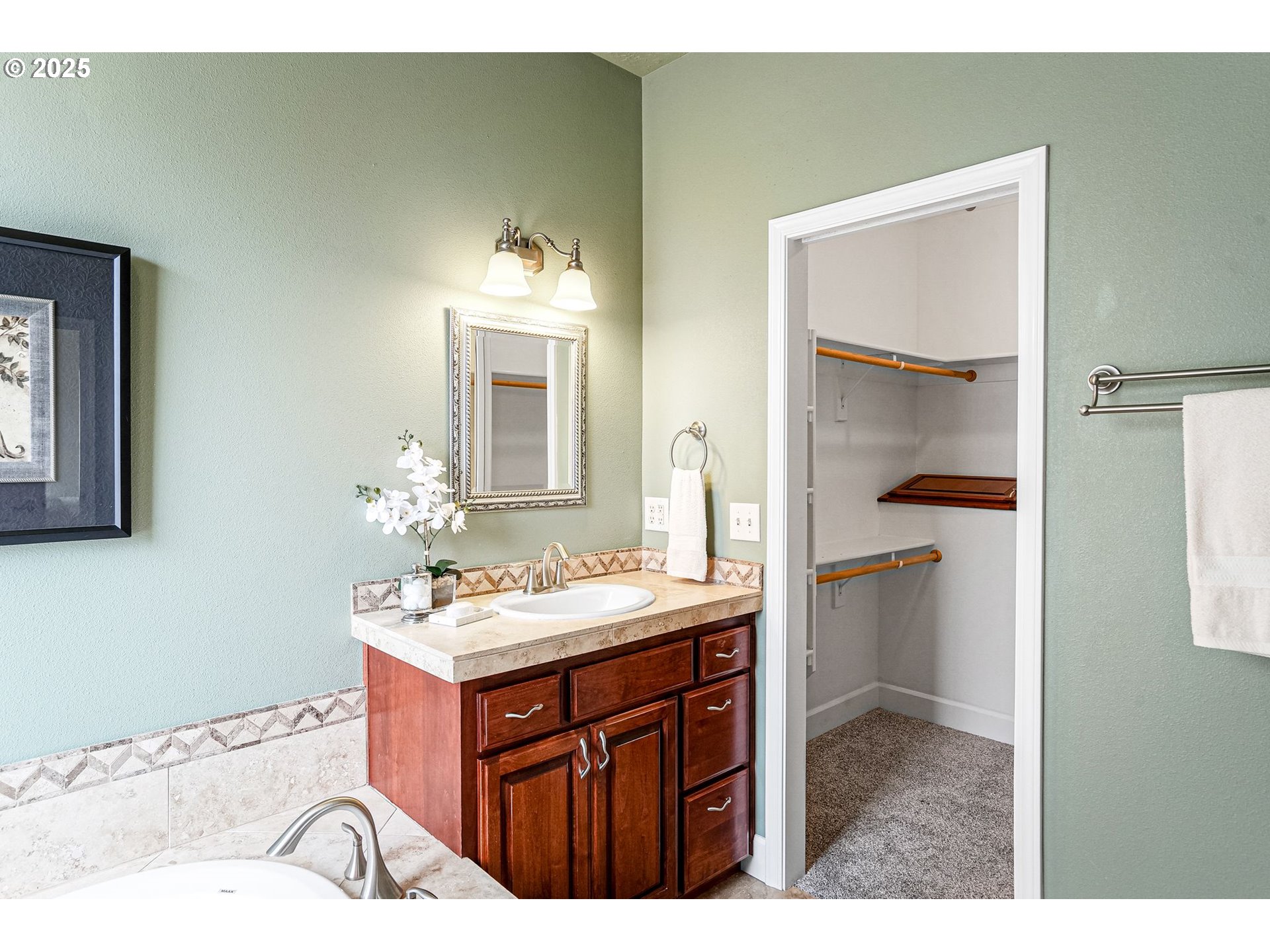 413 Northwest Harold Street Sublimity, OR 97385 - Photo 26 of 48 a bathroom with a sink and a mirror