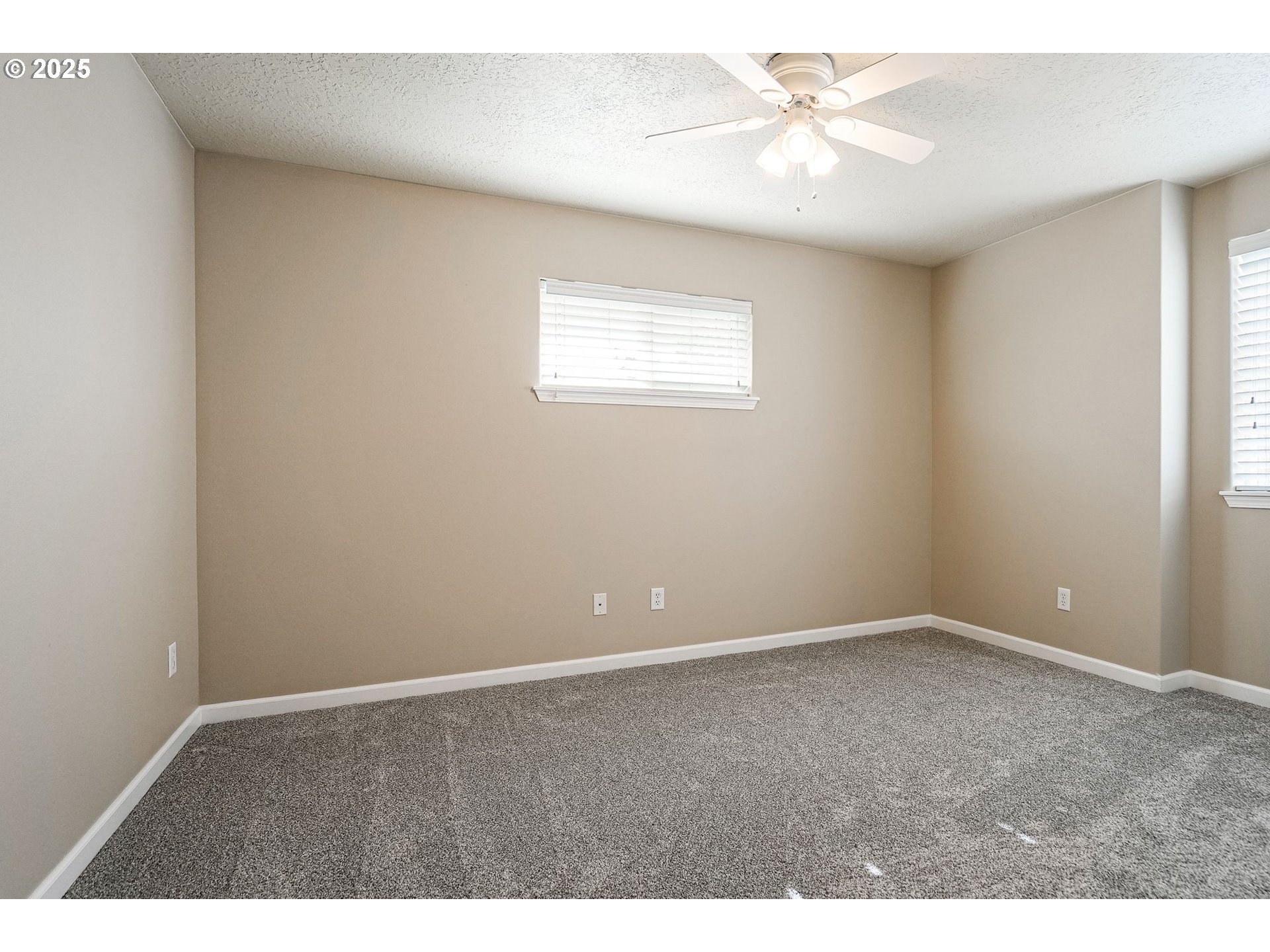 413 Northwest Harold Street Sublimity, OR 97385 - Photo 34 of 48 a view of an empty room with a window