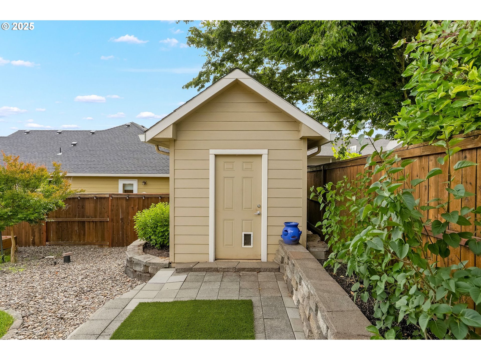 413 Northwest Harold Street Sublimity, OR 97385 - Photo 46 of 48 a view of a house with a yard and potted plants
