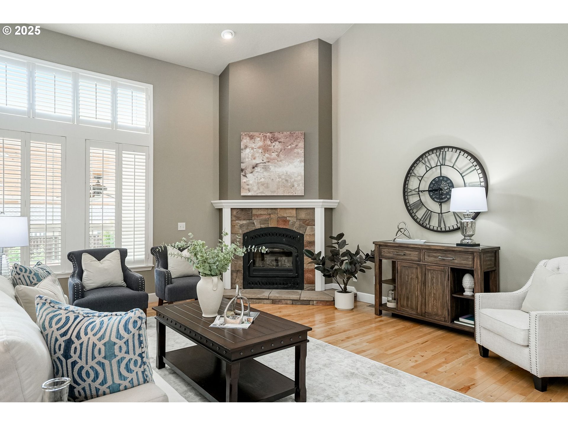 413 Northwest Harold Street Sublimity, OR 97385 - Photo 10 of 48 a living room with furniture a fireplace and a large window