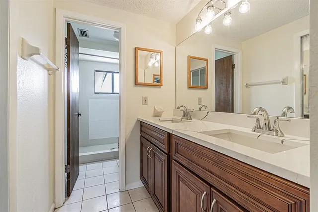 a bathroom with a shower and a toilet