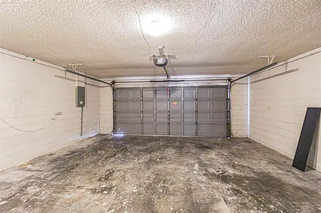 an aerial view of a house with a swimming pool