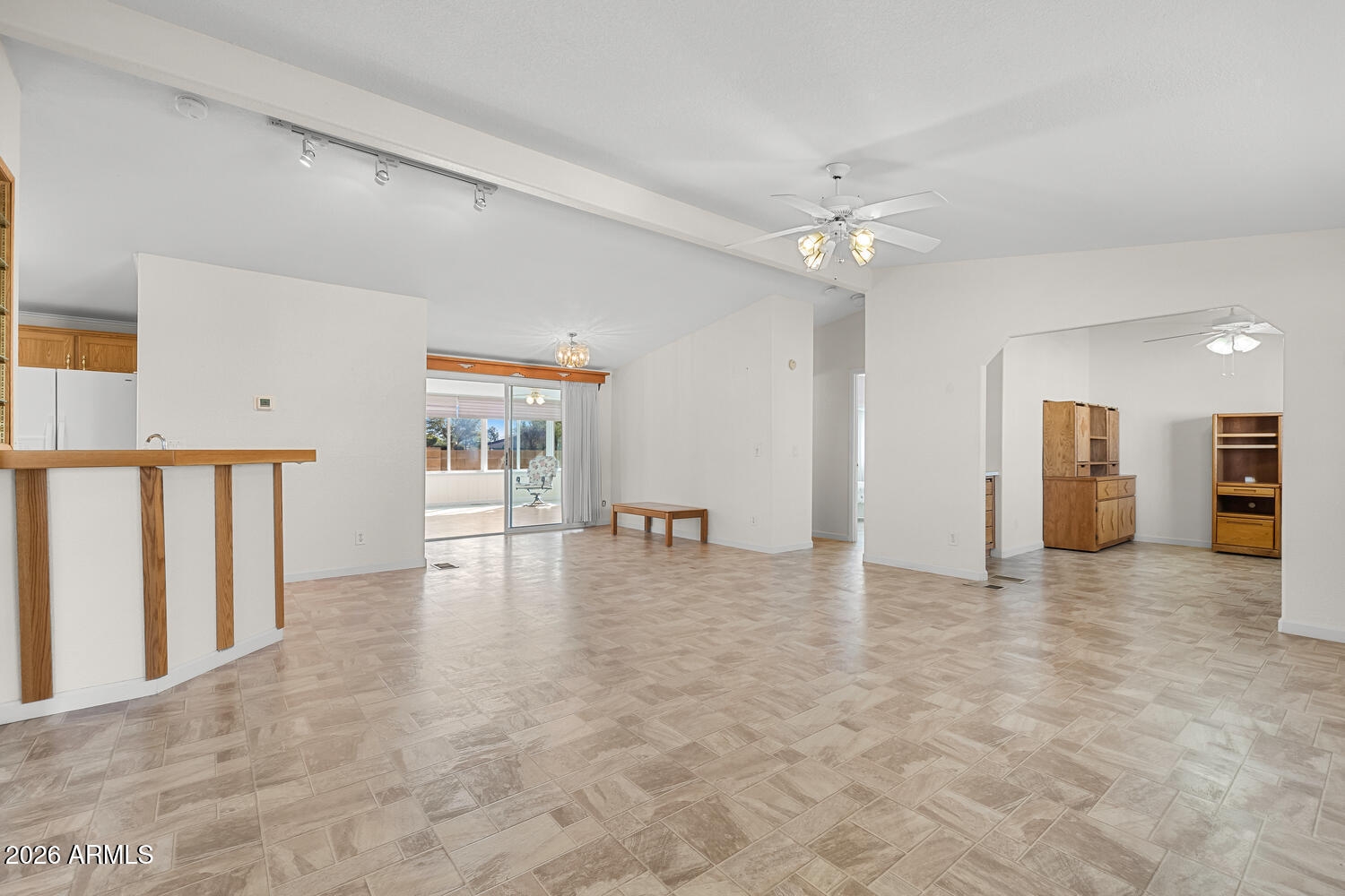 17200 West Bell Road, Unit 2251 Surprise, AZ 85374 - Photo 15 of 35 an empty room with fireplace and windows