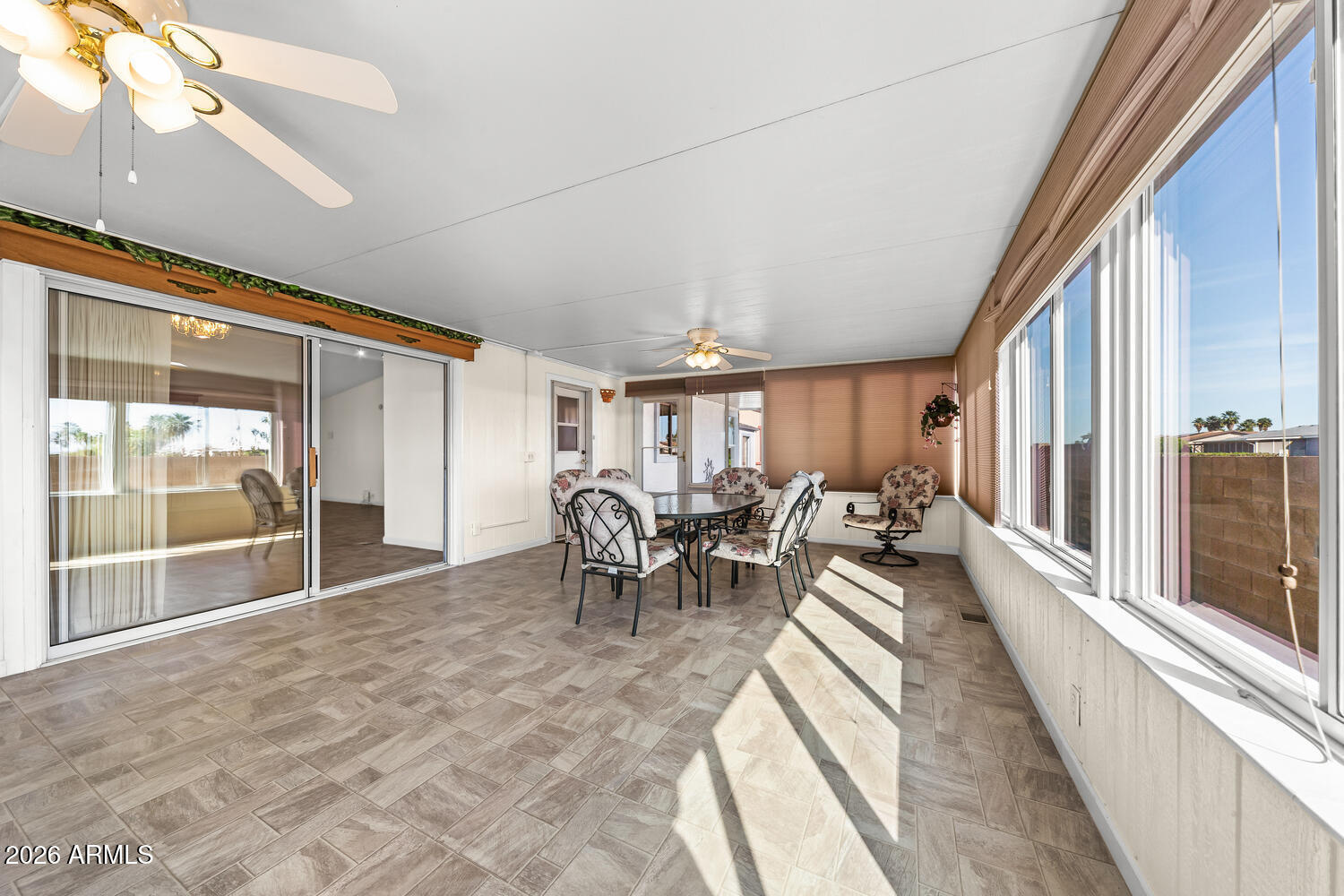 17200 West Bell Road, Unit 2251 Surprise, AZ 85374 - Photo 17 of 35 a lobby with furniture and floor to ceiling window
