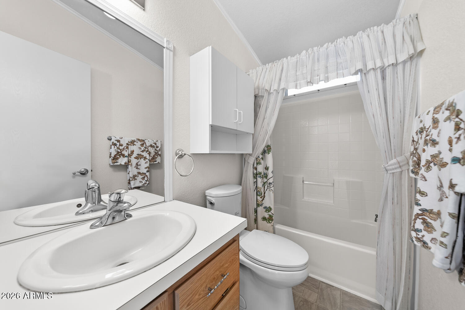 17200 West Bell Road, Unit 2251 Surprise, AZ 85374 - Photo 29 of 35 a bathroom with a sink toilet and shower