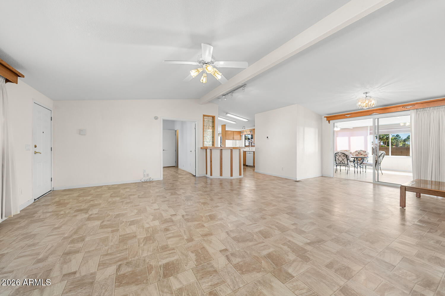 17200 West Bell Road, Unit 2251 Surprise, AZ 85374 - Photo 3 of 35 wooden floor in an empty room with a window