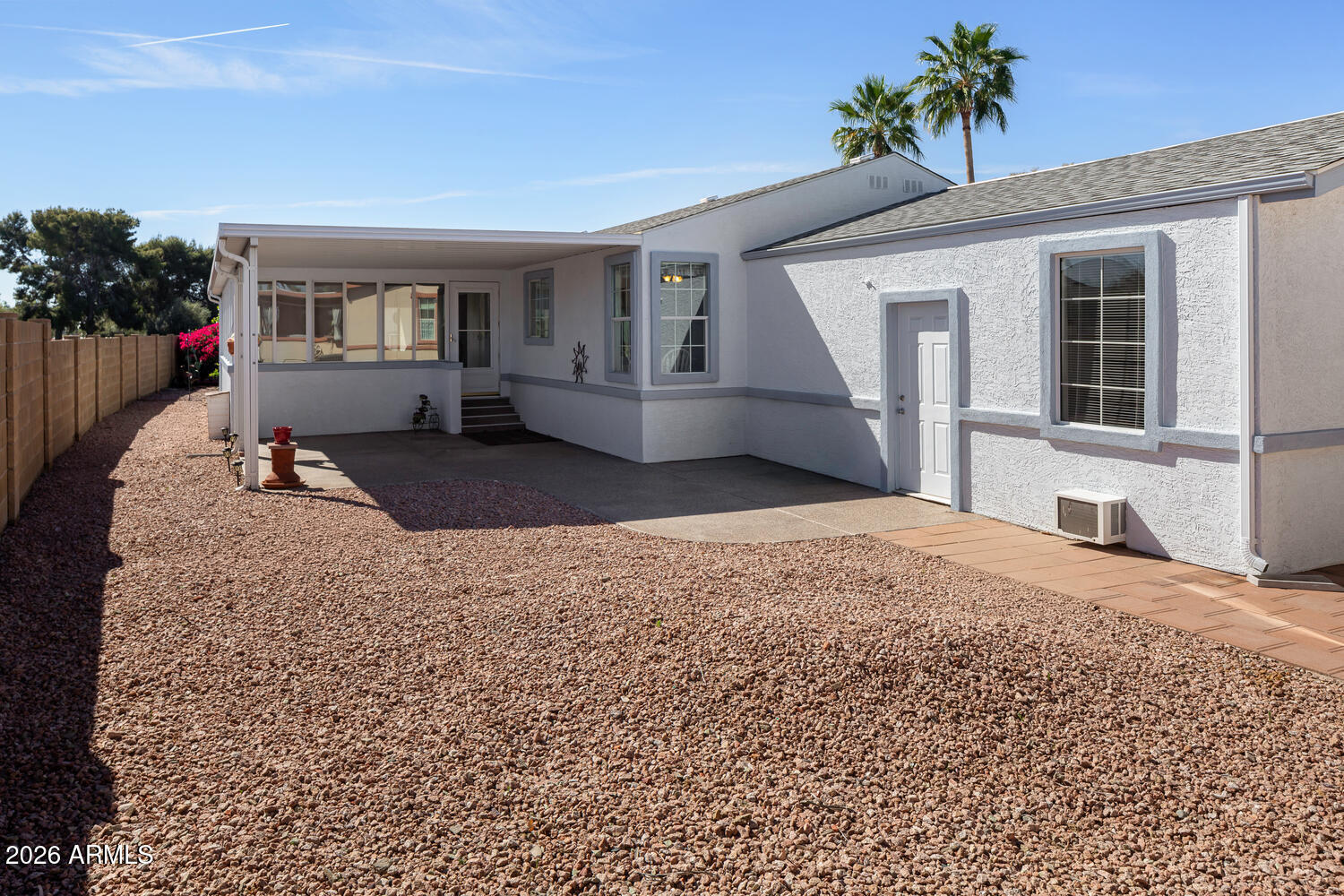 17200 West Bell Road, Unit 2251 Surprise, AZ 85374 - Photo 34 of 35 a front view of a house with a yard