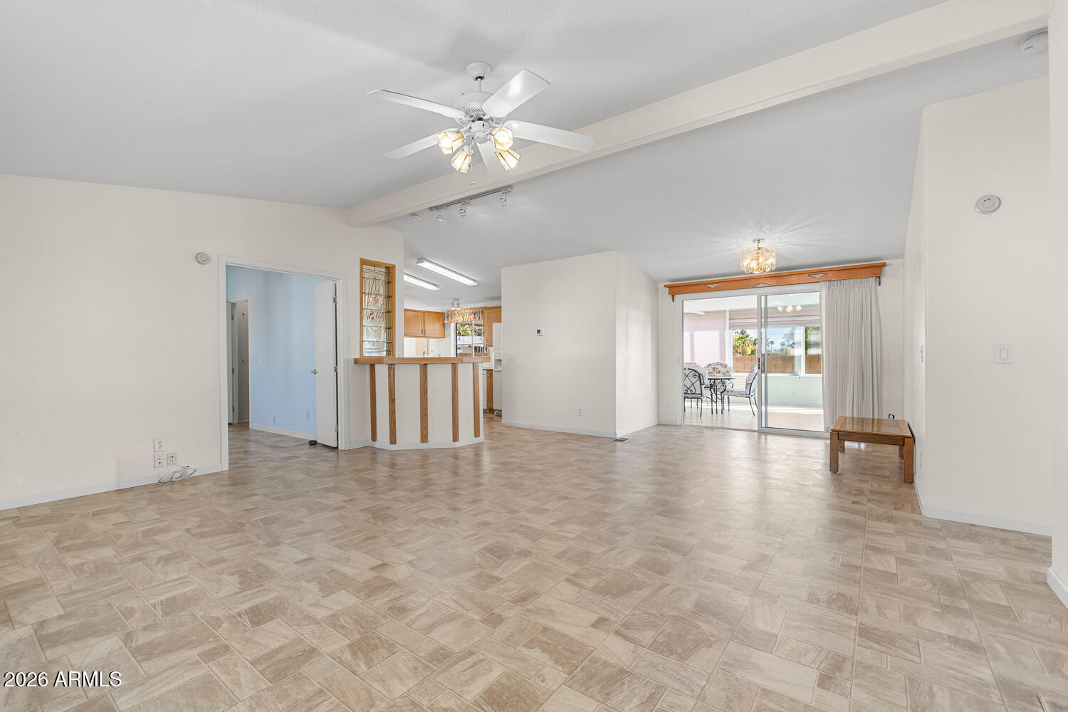 17200 West Bell Road, Unit 2251 Surprise, AZ 85374 - Photo 5 of 35 a view of an empty room with glass door