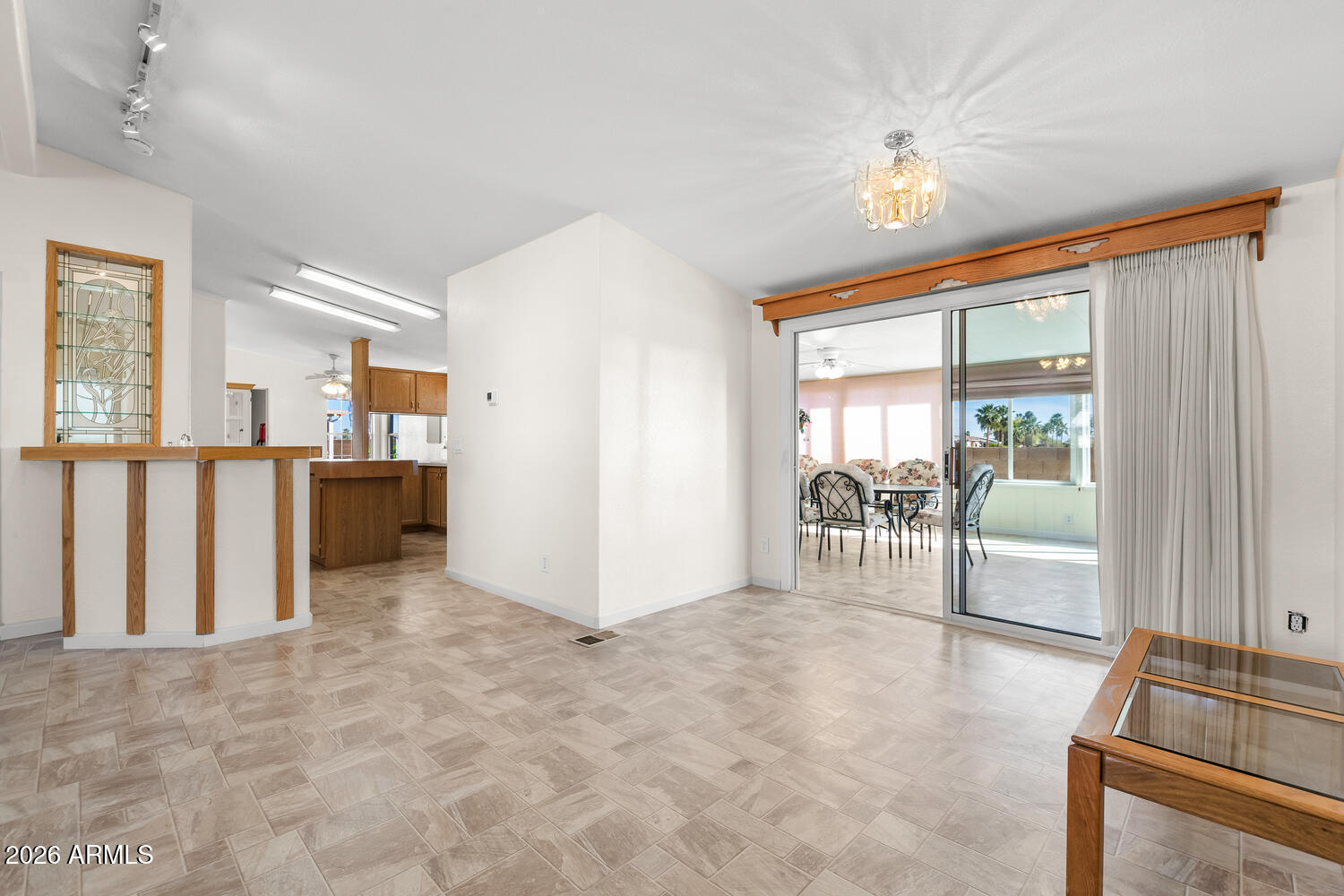 17200 West Bell Road, Unit 2251 Surprise, AZ 85374 - Photo 6 of 35 a view of a livingroom with furniture and an entryway