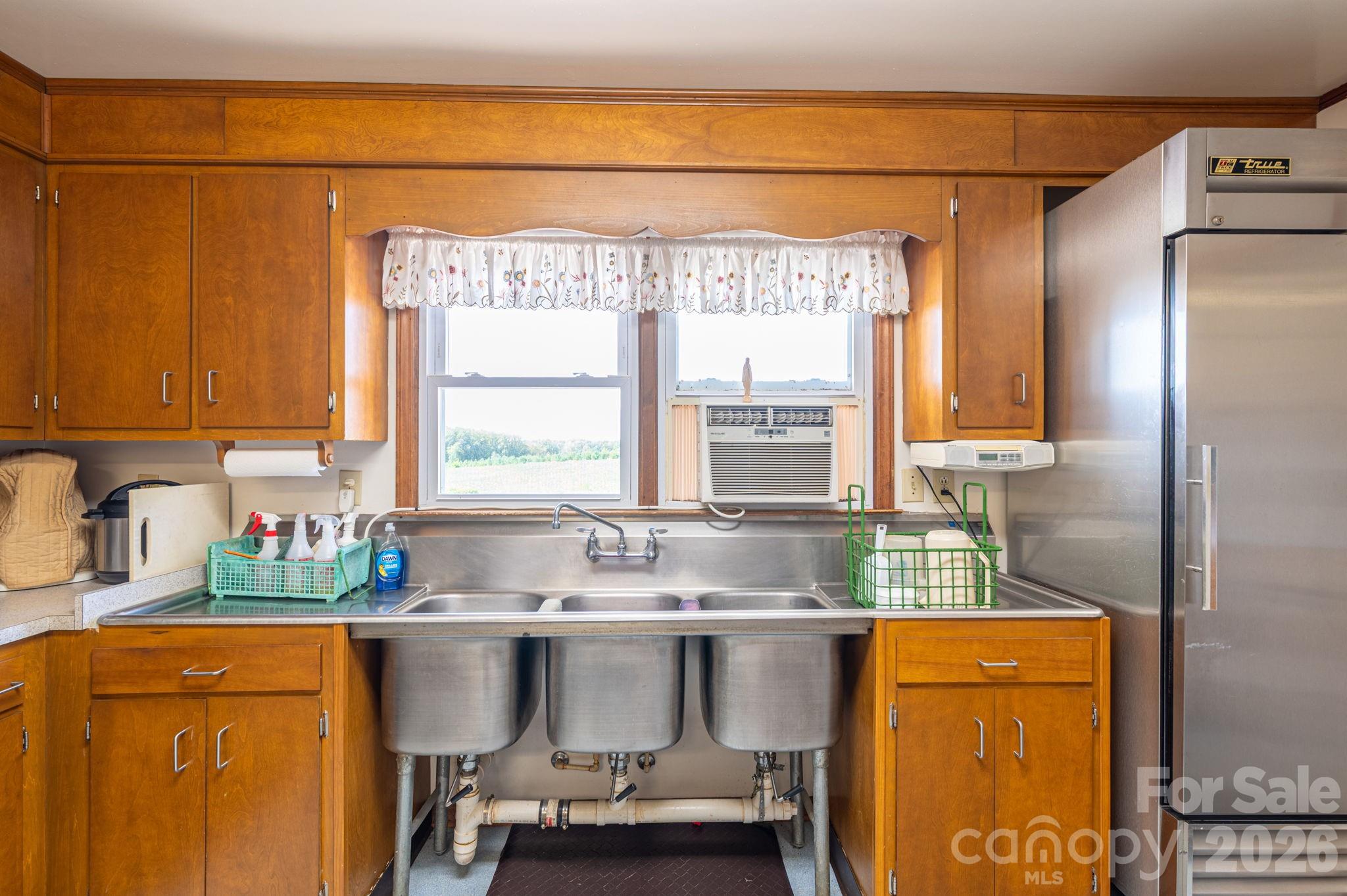 2482 June Bug Road Vale, NC 28168 - Photo 17 of 34 a kitchen with stainless steel appliances granite countertop a refrigerator and a sink