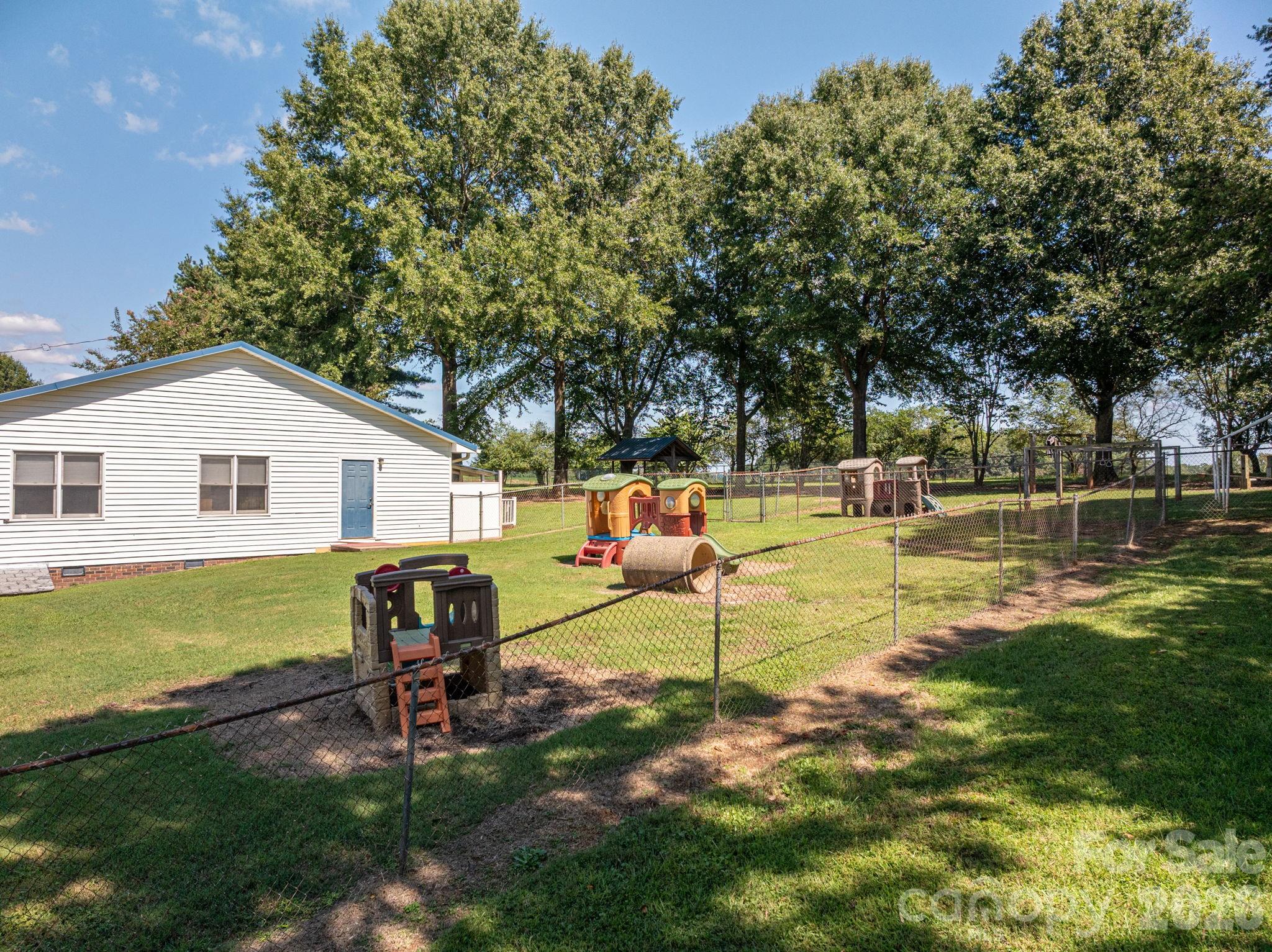 2482 June Bug Road Vale, NC 28168 - Photo 4 of 34 a view of a house with backyard porch and sitting area