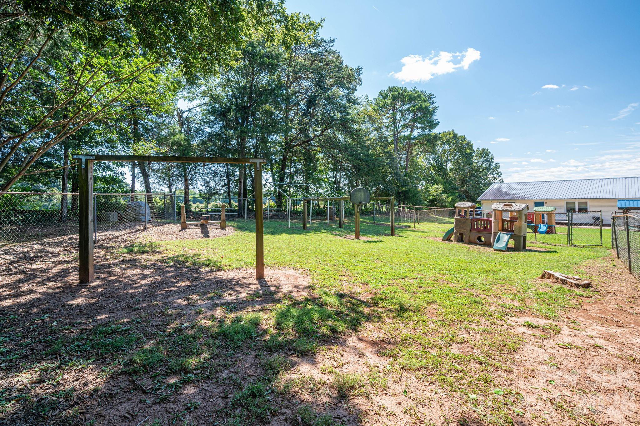 2482 June Bug Road Vale, NC 28168 - Photo 10 of 34 a view of a house with backyard and porch